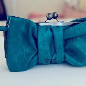 Brand new Jessica Simpson Blue Bow clasp clutch